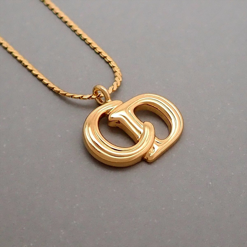 Buy Vintage CHRISTIAN DIOR D Logo Pendant Snake Chain Necklace Online in  India - Etsy